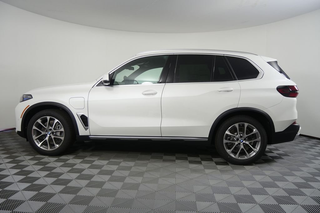 Used 2026 Mineral White Metallic BMW xDrive50e image 6