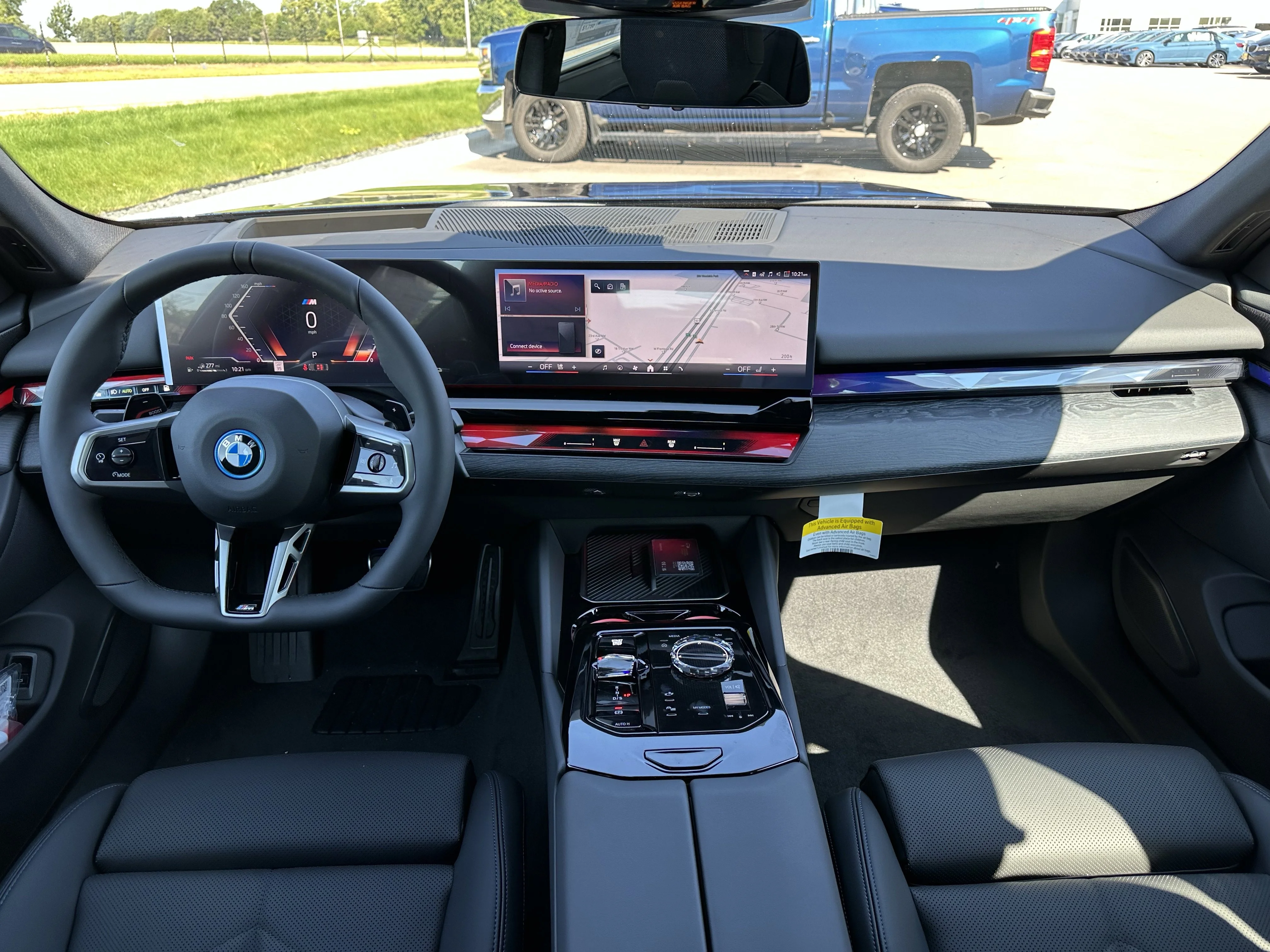 2026 BMW 5 Series 550e - Photo 10