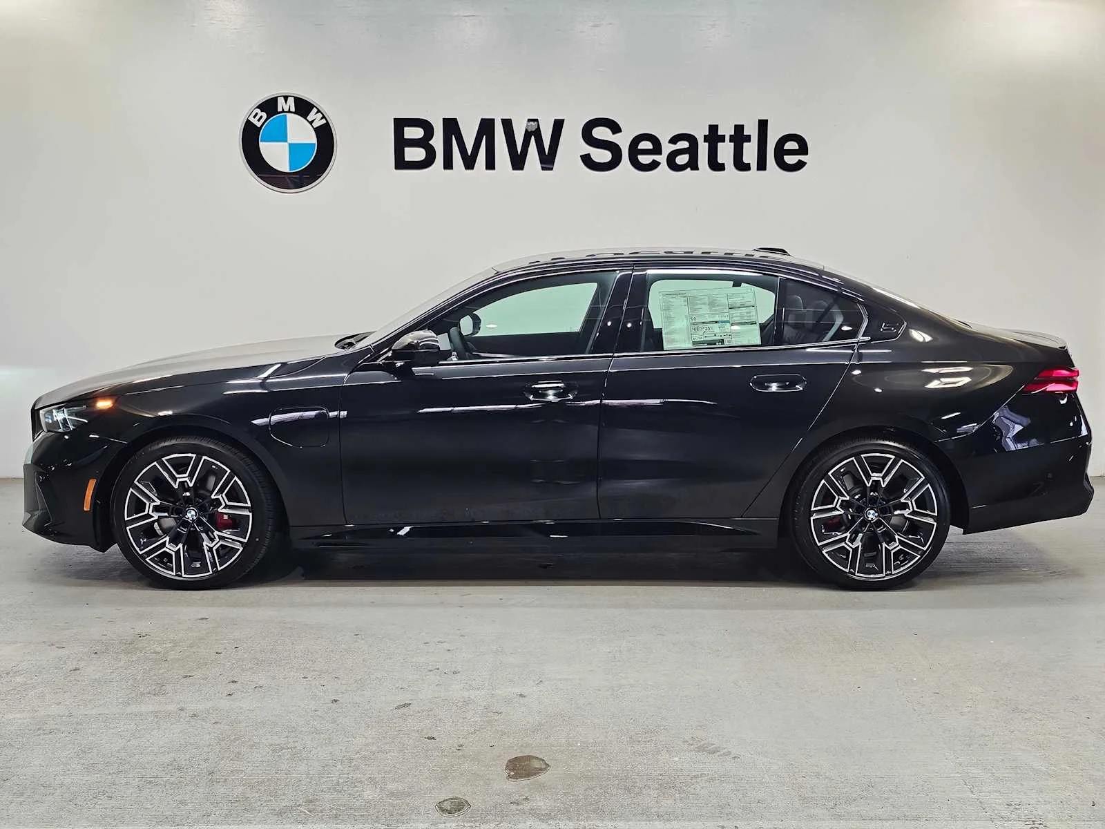 New 2027 Black Sapphire Metallic BMW xDrive image 3