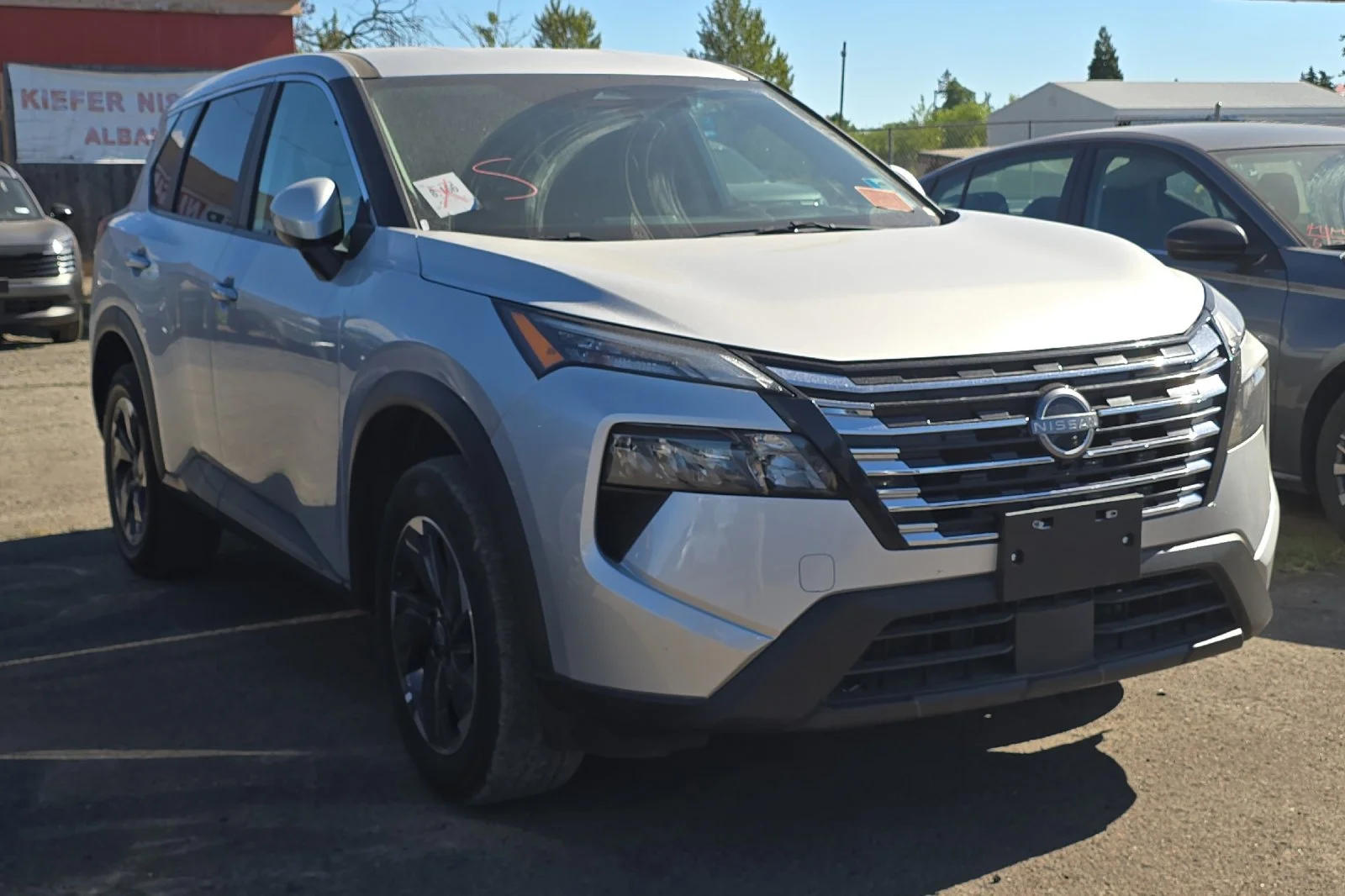 Used 2025 Brilliant Silver Metallic Nissan SV image 2