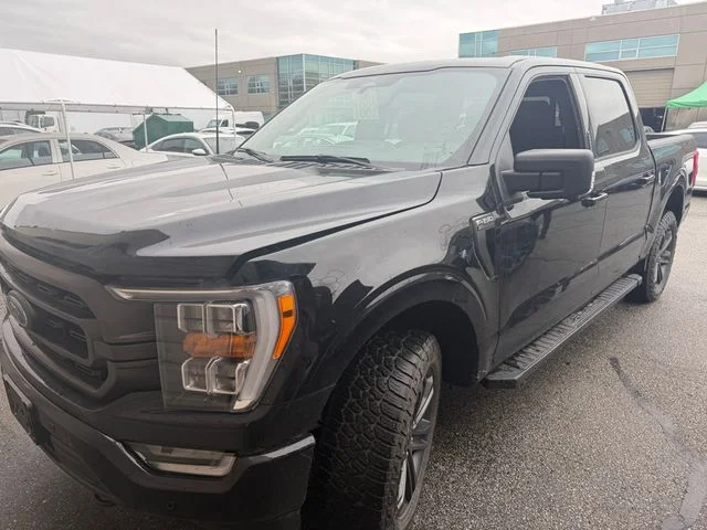 Certified Used 2023 Agate Black Metallic Ford XLT image 1