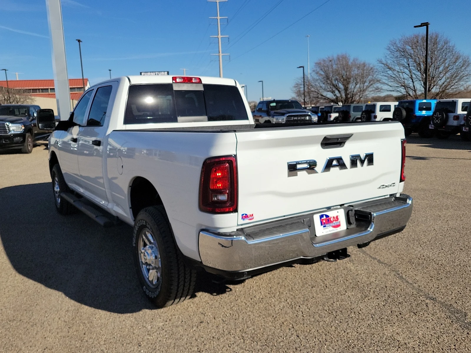 New 2026 PW7 Bright Whit Ram TRADESMAN CREW CAB 4X4 6
