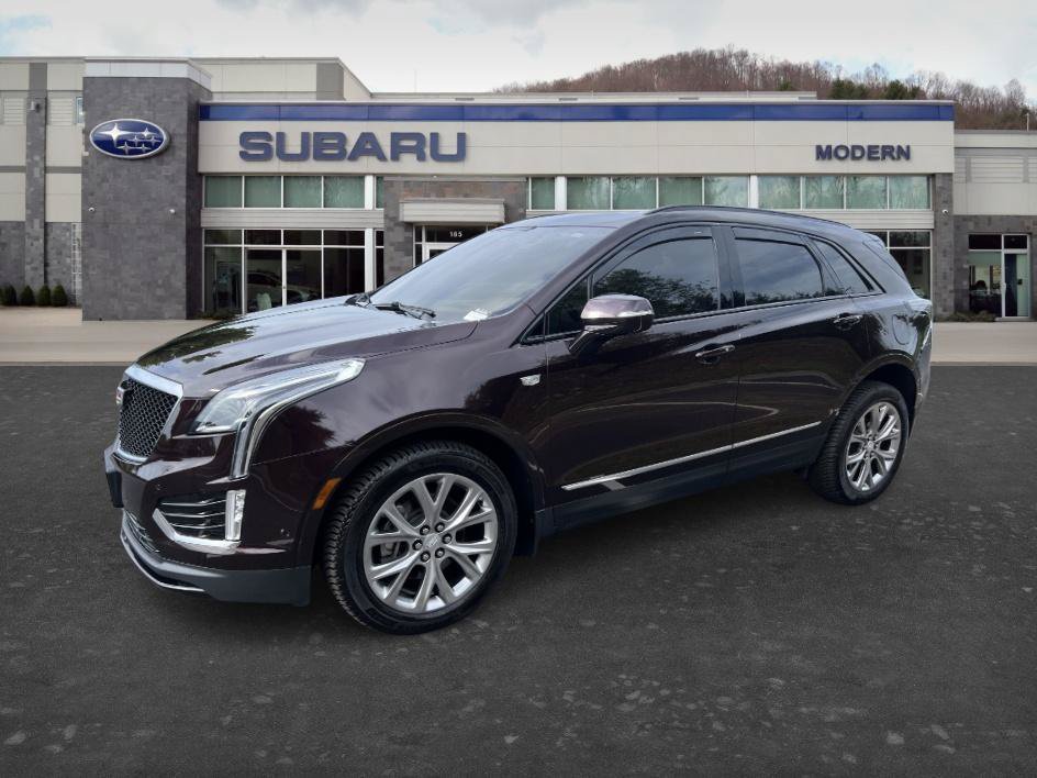 Used 2020 Garnet Metallic Cadillac Sport AWD image 1