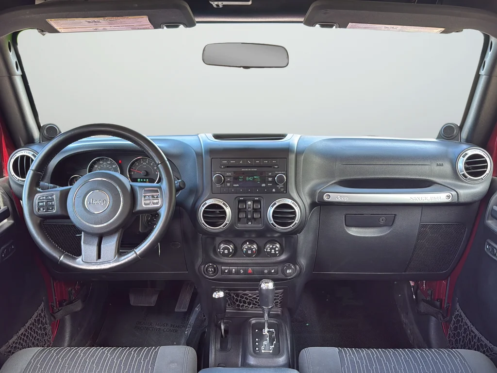 Used 2012 Red Jeep Unlimited Sahara image 9