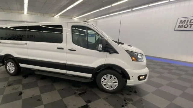 New 2026 Oxford White Ford Passenger Van XLT image 9