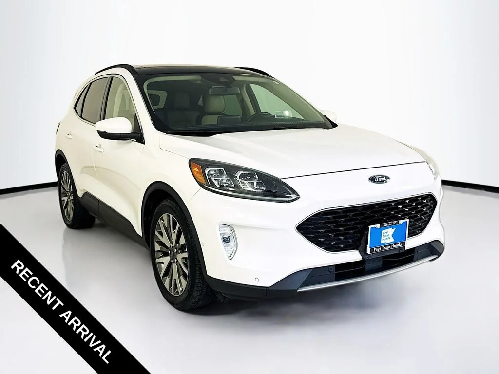 Used 2020 White Metallic Ford Titanium image 1