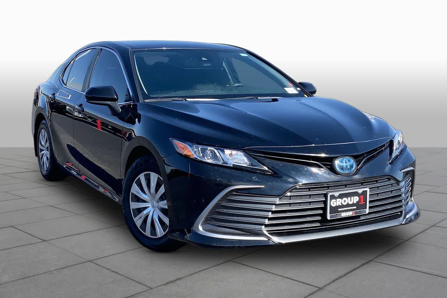 Used 2023 Midnight Black Metallic Toyota Hybrid LE image 3