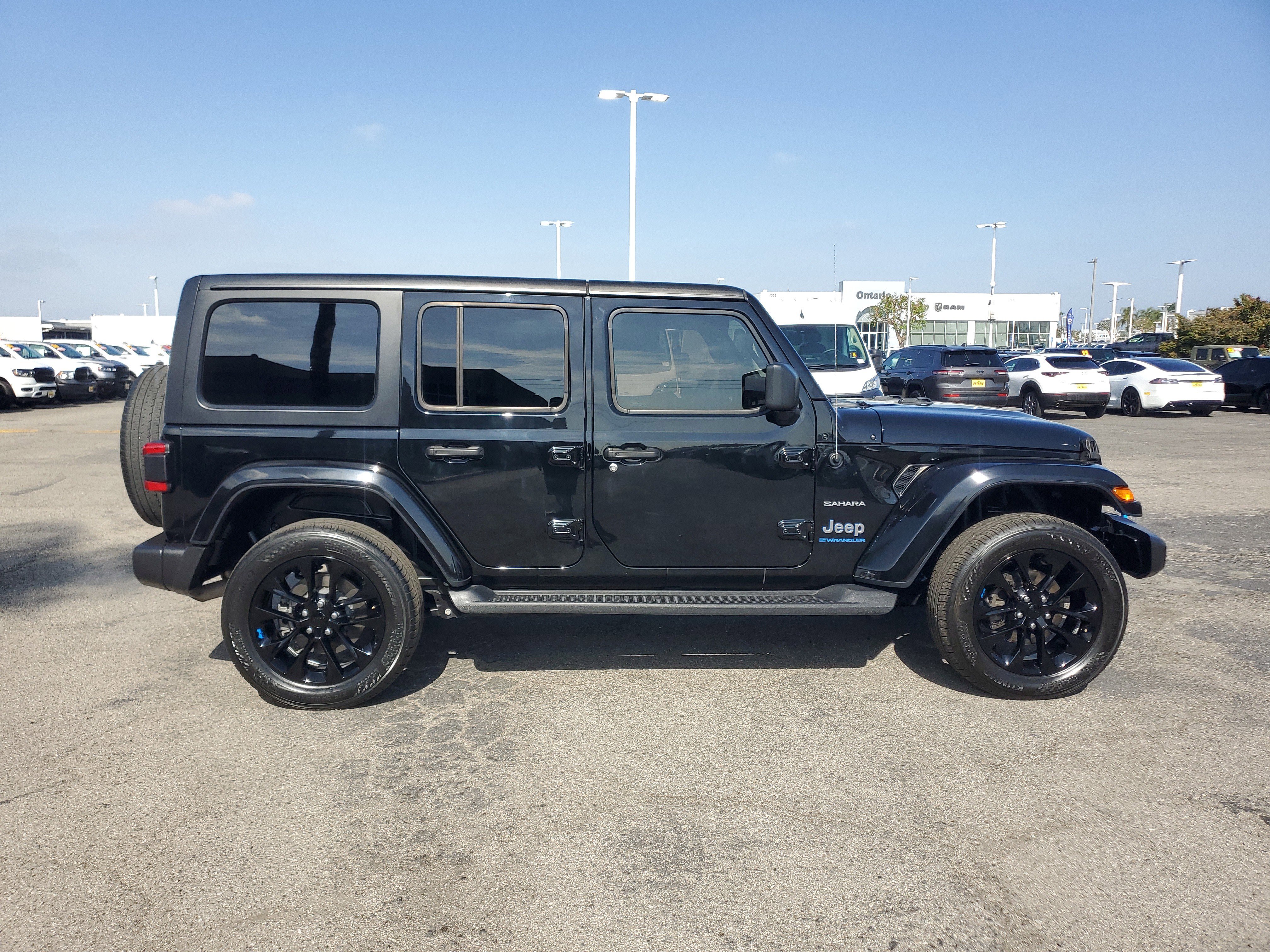 Used 2023 Jeep Wrangler 4xe Sahara 4XE with VIN 1C4JJXP60PW583133 for sale in Ontario, CA