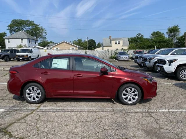 New 2026 Red Toyota LE image 2