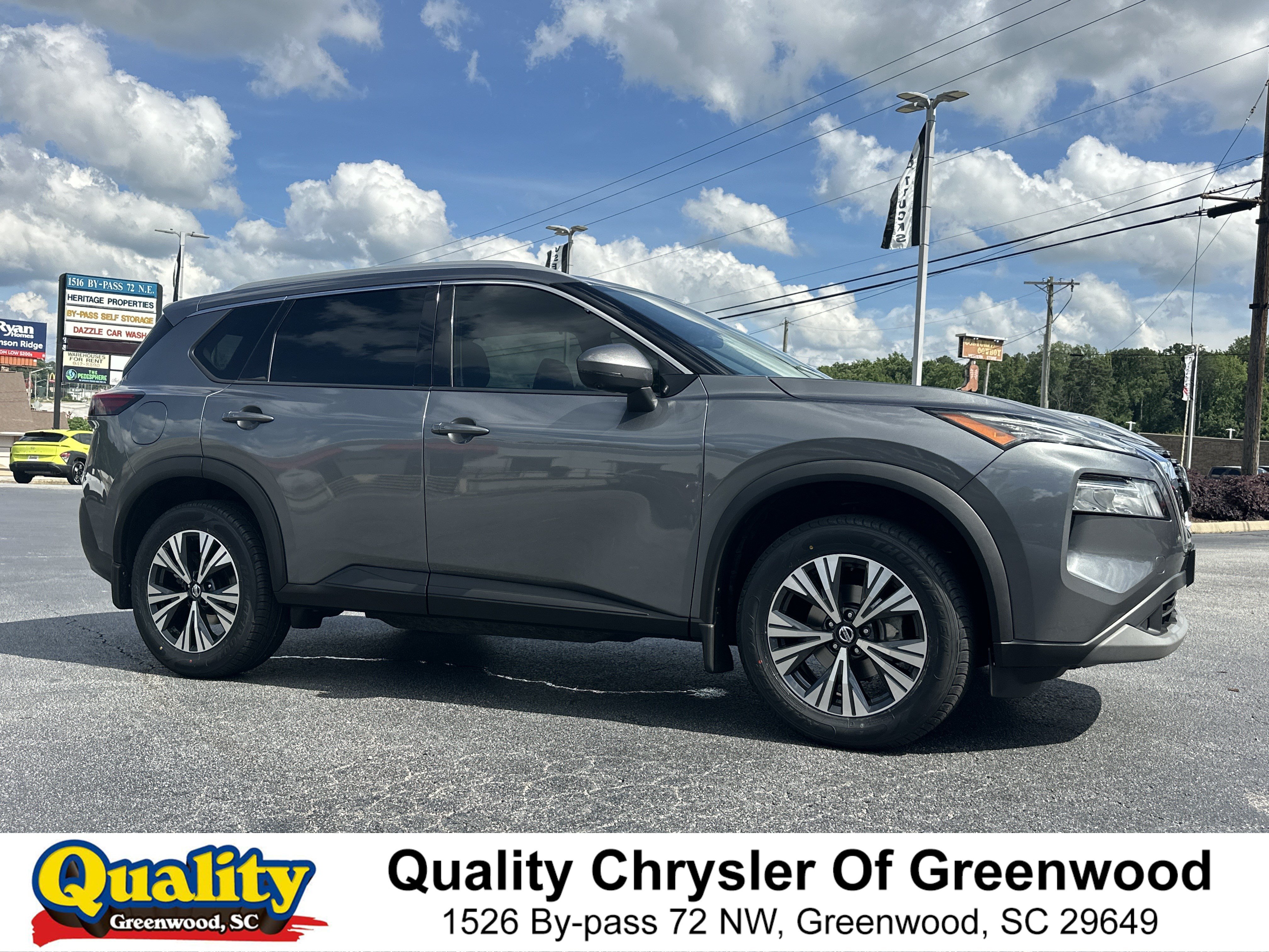 Used 2021 Gun Metallic Nissan SV image 1