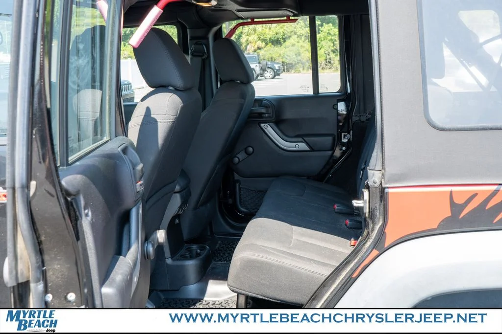 Used 2015 Black Clearcoat Jeep Unlimited Sport image 14
