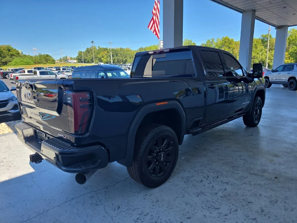 Used 2024 Titanium Rush Metallic GMC AT4 image 2