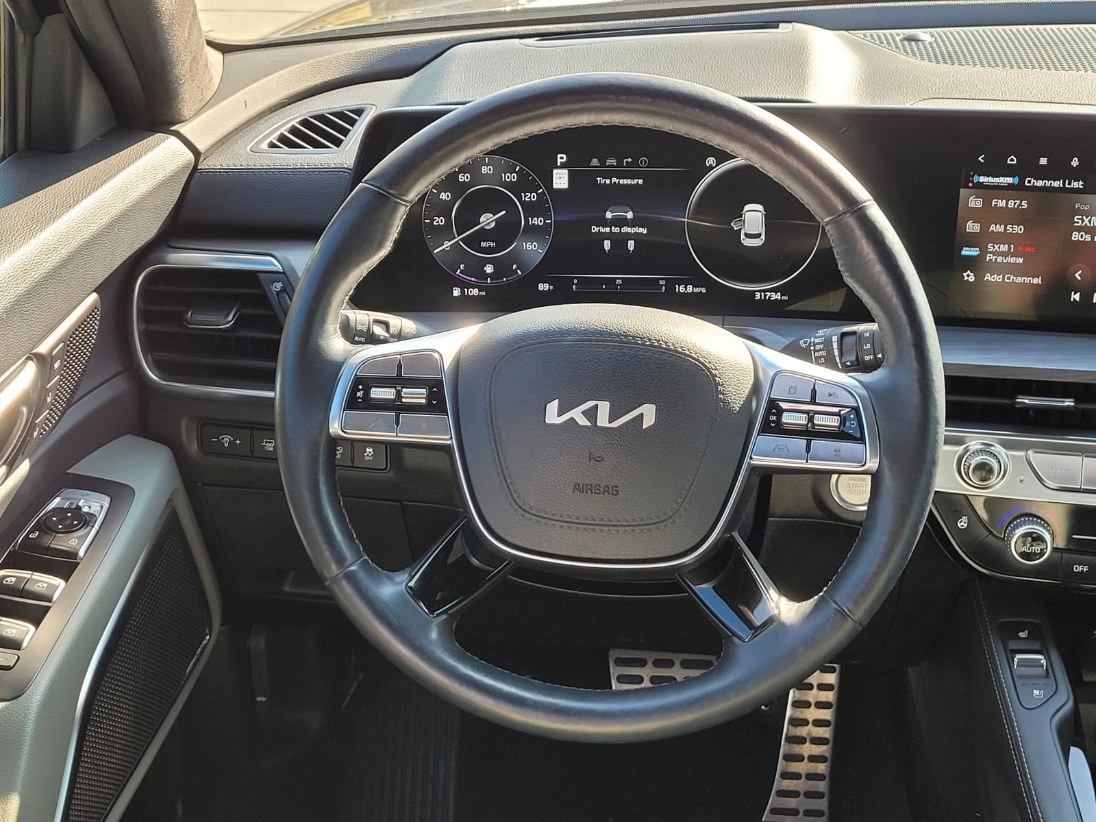 Used 2024 Ebony Black Kia SX Prestige X-Pro image 6