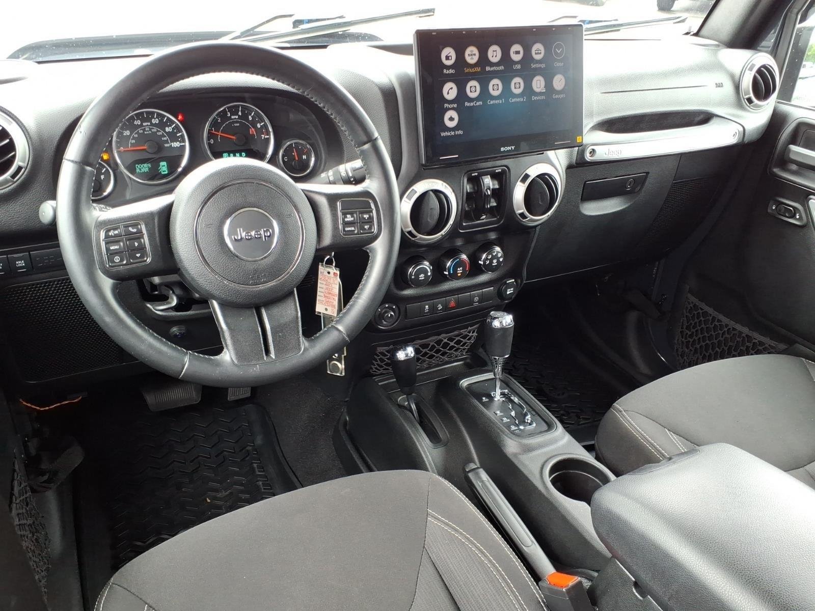 Used 2017 Granite Crystal Metallic Clearcoat Jeep Rubicon image 22
