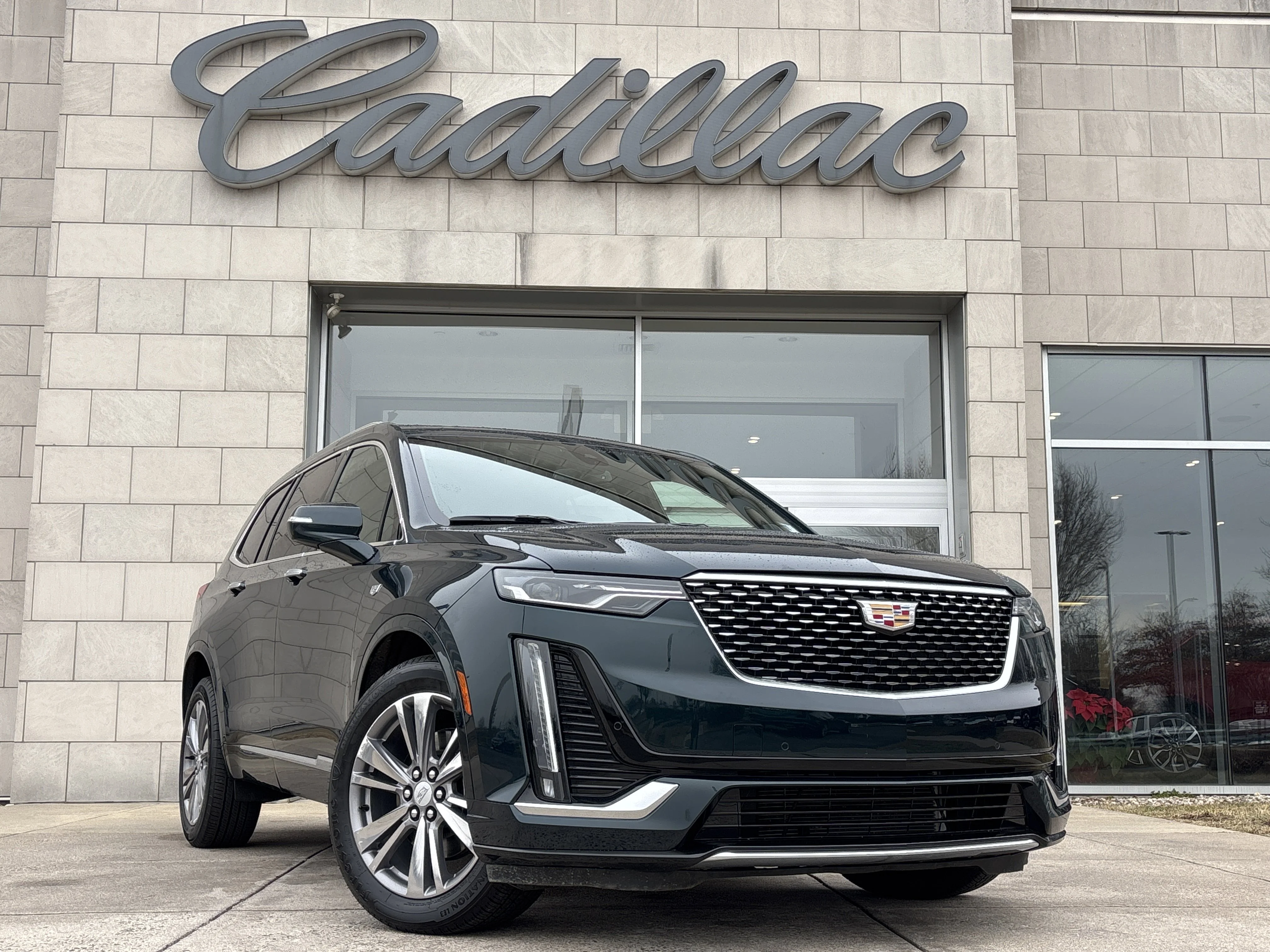 Used 2025 Emerald Lake Metallic Cadillac AWD Premium Luxury image 1