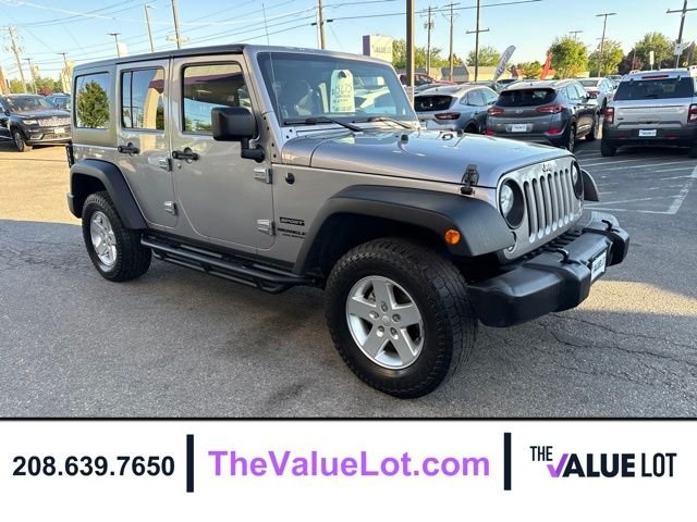 Used 2014 Gray Jeep Unlimited Sport image 2