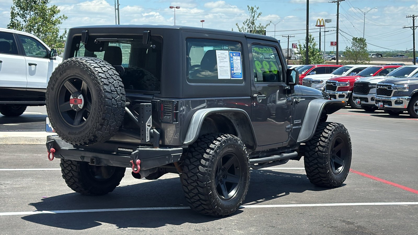Used 2014 Granite Crystal Metallic Clearcoat Jeep Sport image 5