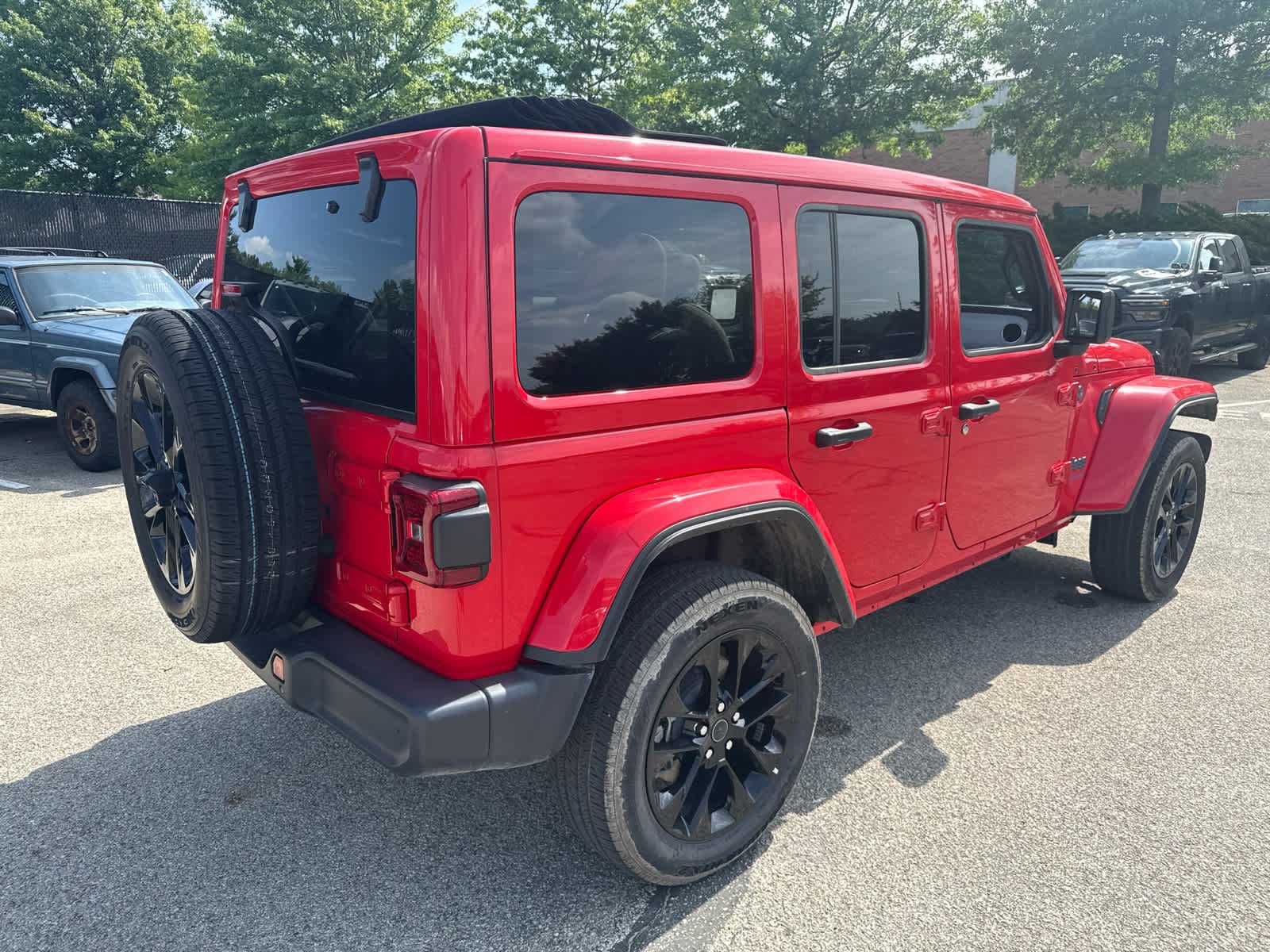 Used 2025 Firecracker Red Clearcoat Jeep Sahara image 4