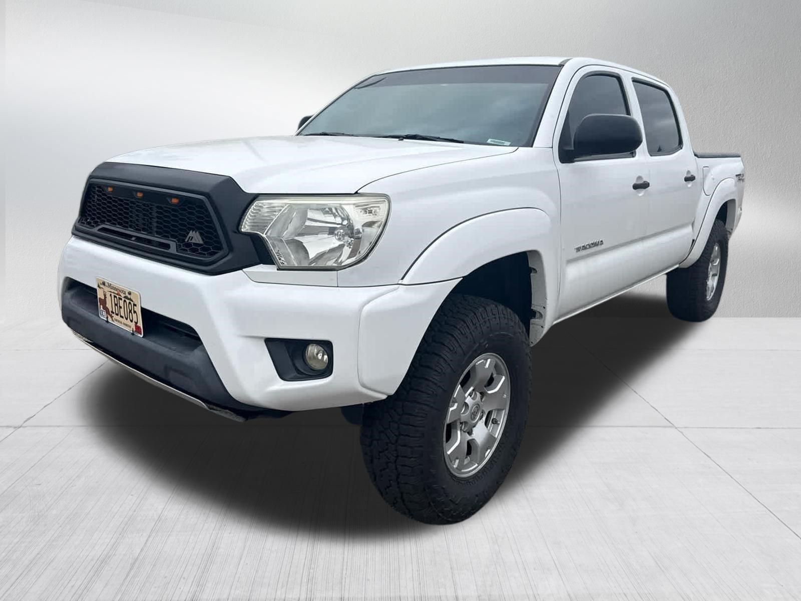 Used 2014 Toyota Tacoma Base with VIN 3TMLU4EN0EM159716 for sale in Brooklyn Center, MN