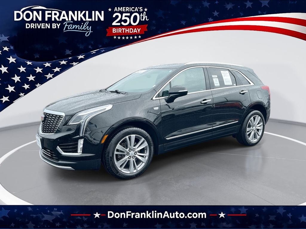 Used 2024 Black Cadillac Premium Luxury image 1