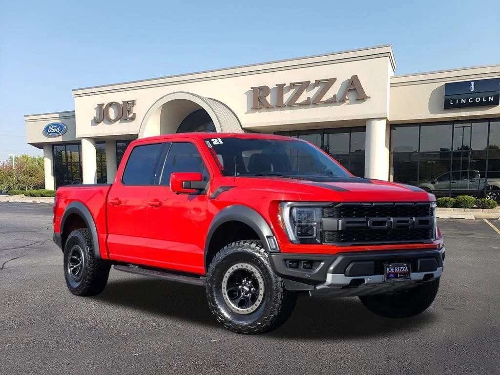 Used 2021 Orange Ford Raptor image 1