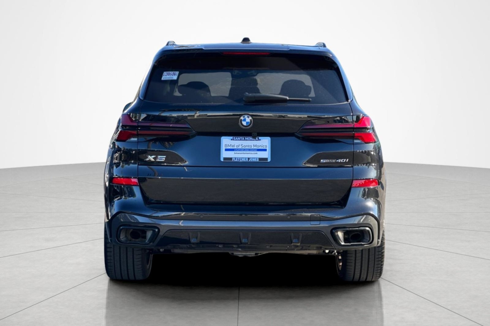 Used 2024 Black Sapphire Metallic BMW sDrive40i image 4