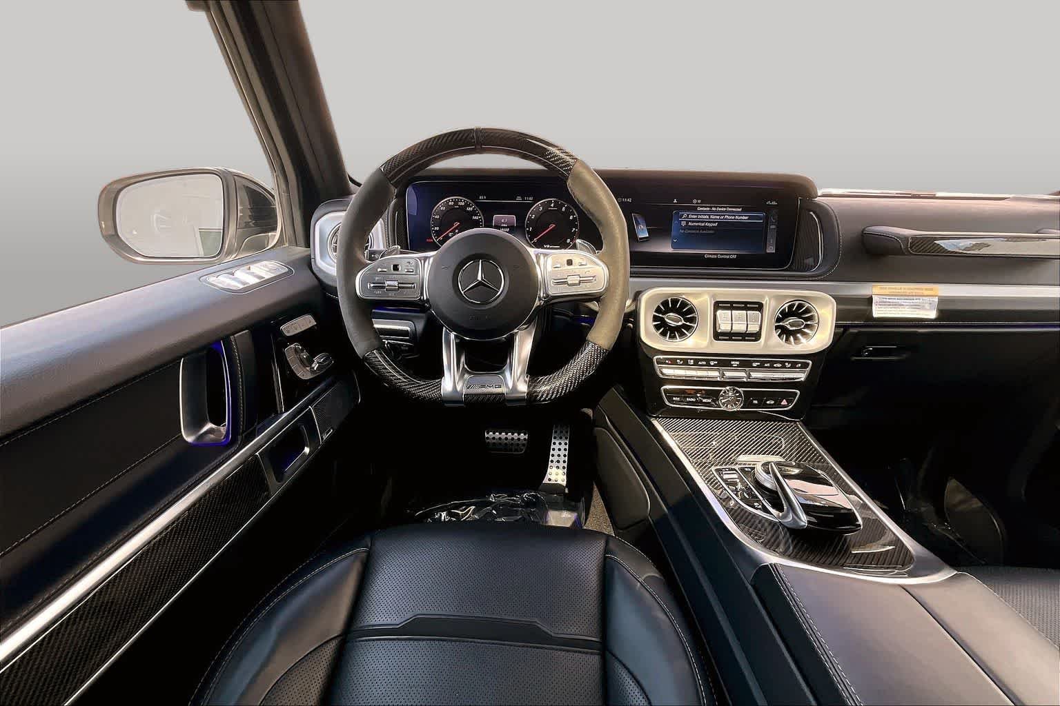 Used 2023 MANUFAKTUR Moonlight White Metallic Mercedes-Benz AMG® G 63 image 6