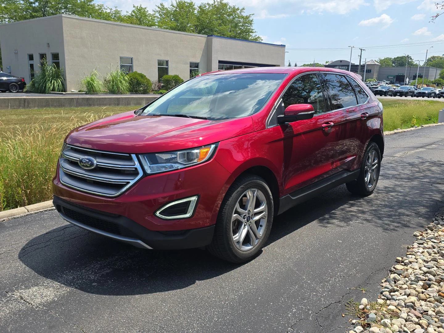 Used 2017 Ruby Red Metallic Tinted Clearcoat Ford Titanium image 3