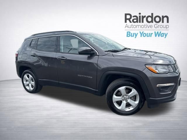 Used 2021 Granite Crystal Metallic Clearcoat Jeep Latitude image 1