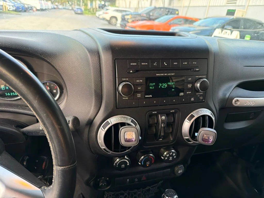 Used 2013 True Blue Pearlcoat Jeep Unlimited Freedom Edition image 4