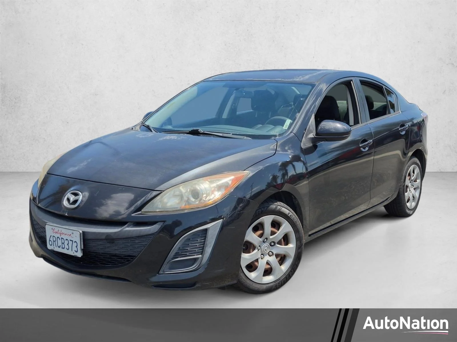 Used 2011 Black Mica Mazda i Sport image 1