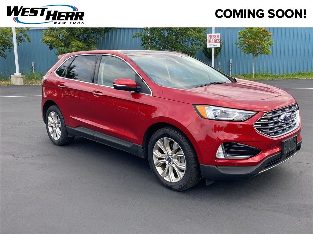 Used 2020 Rapid Red Metallic Tinted Clearcoat Ford Titanium image 1