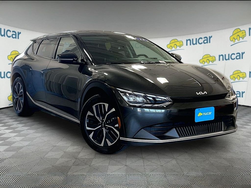 Used 2024 Gray Kia Light image 1
