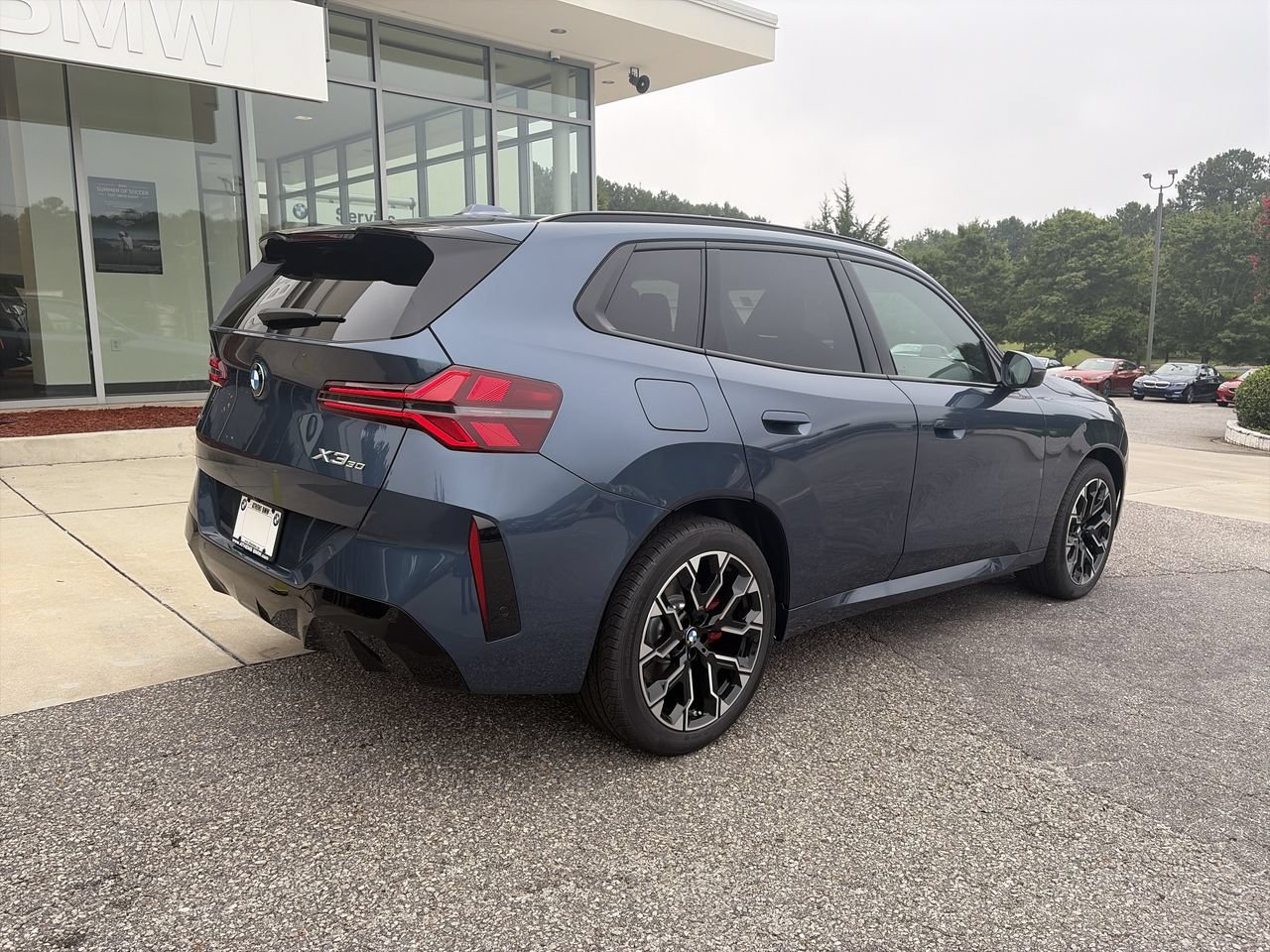 New 2026 Arctic Race Blue Metallic BMW 30 xDrive image 8