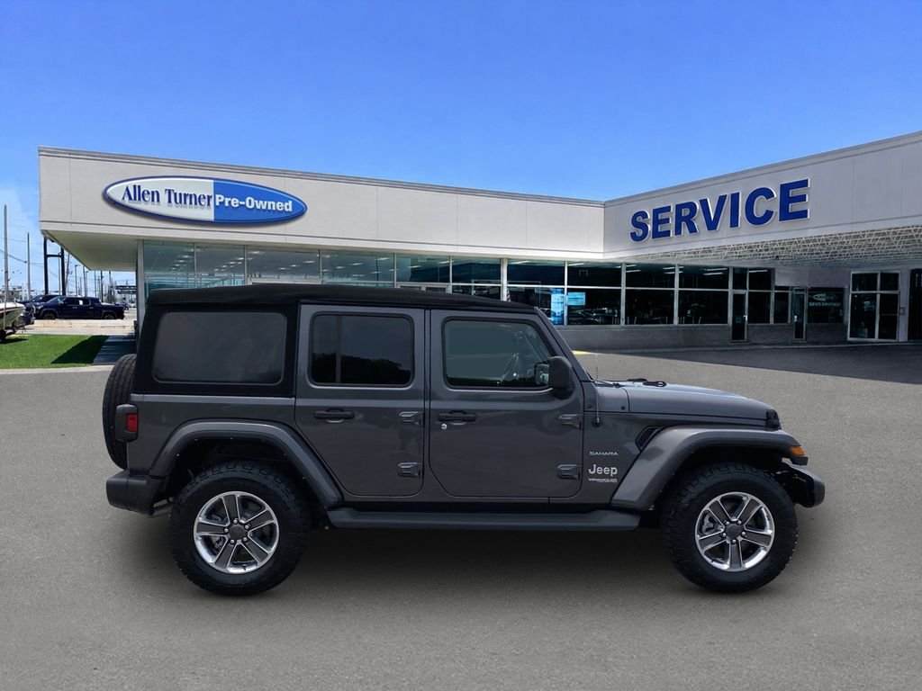 Used 2022 Granite Crystal Metallic Clearcoat Jeep Unlimited Sahara image 9