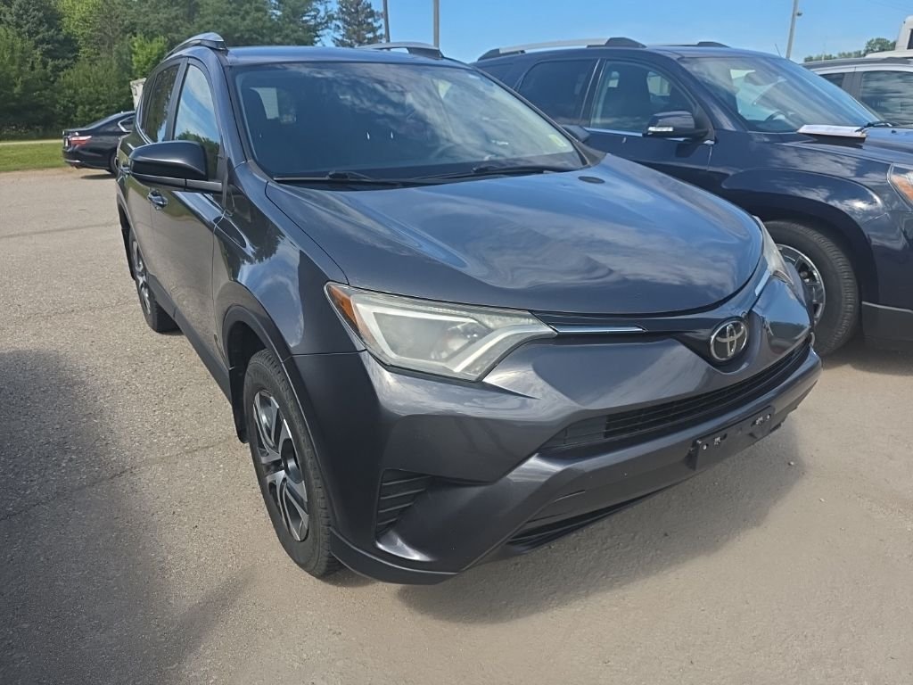 Used 2017 Gray Toyota LE image 1
