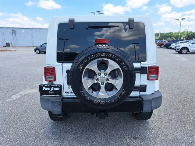 Used 2014 White Jeep Unlimited Sahara image 4