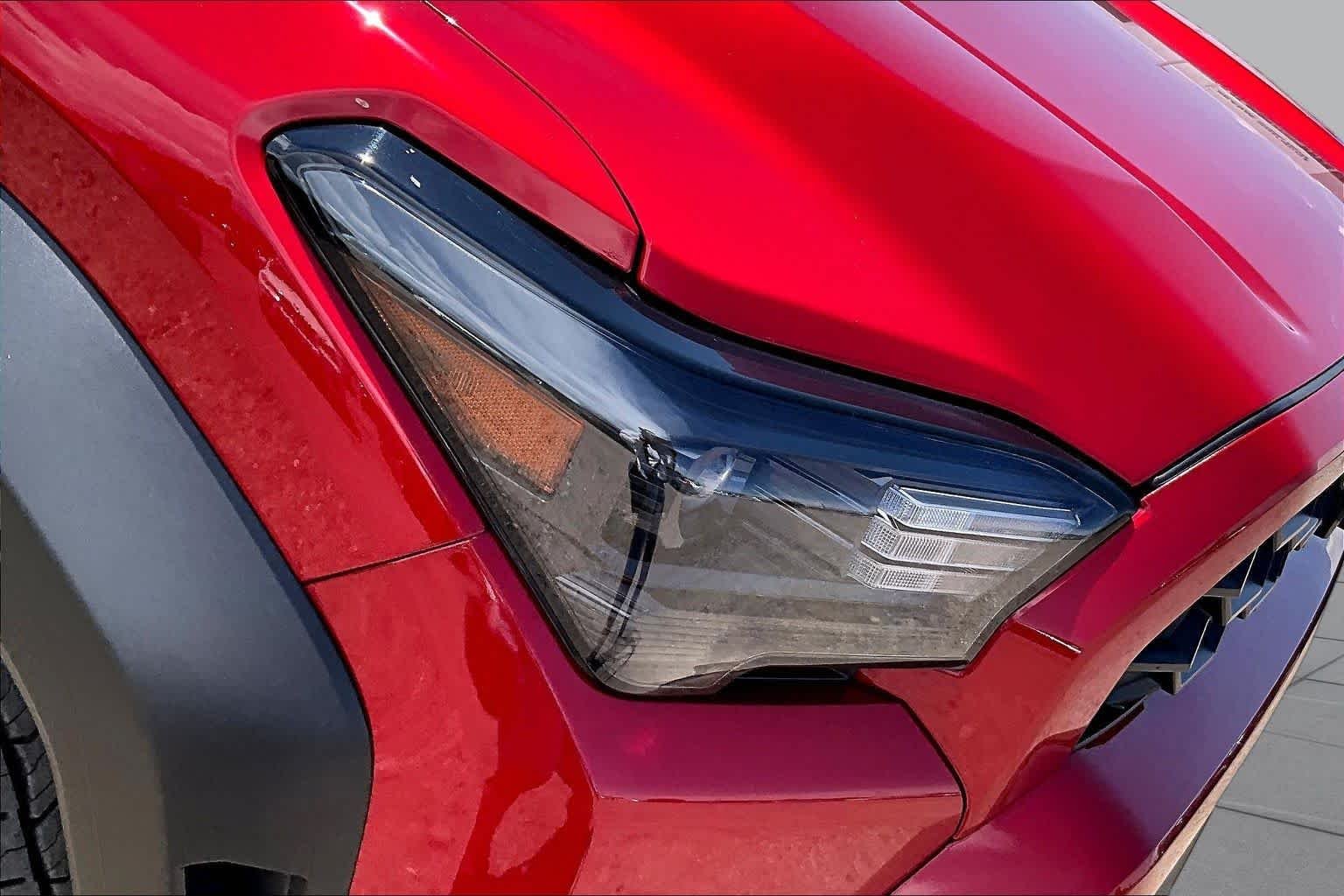 Used 2025 Supersonic Red Toyota Hybrid TRD Off Road Premium image 25