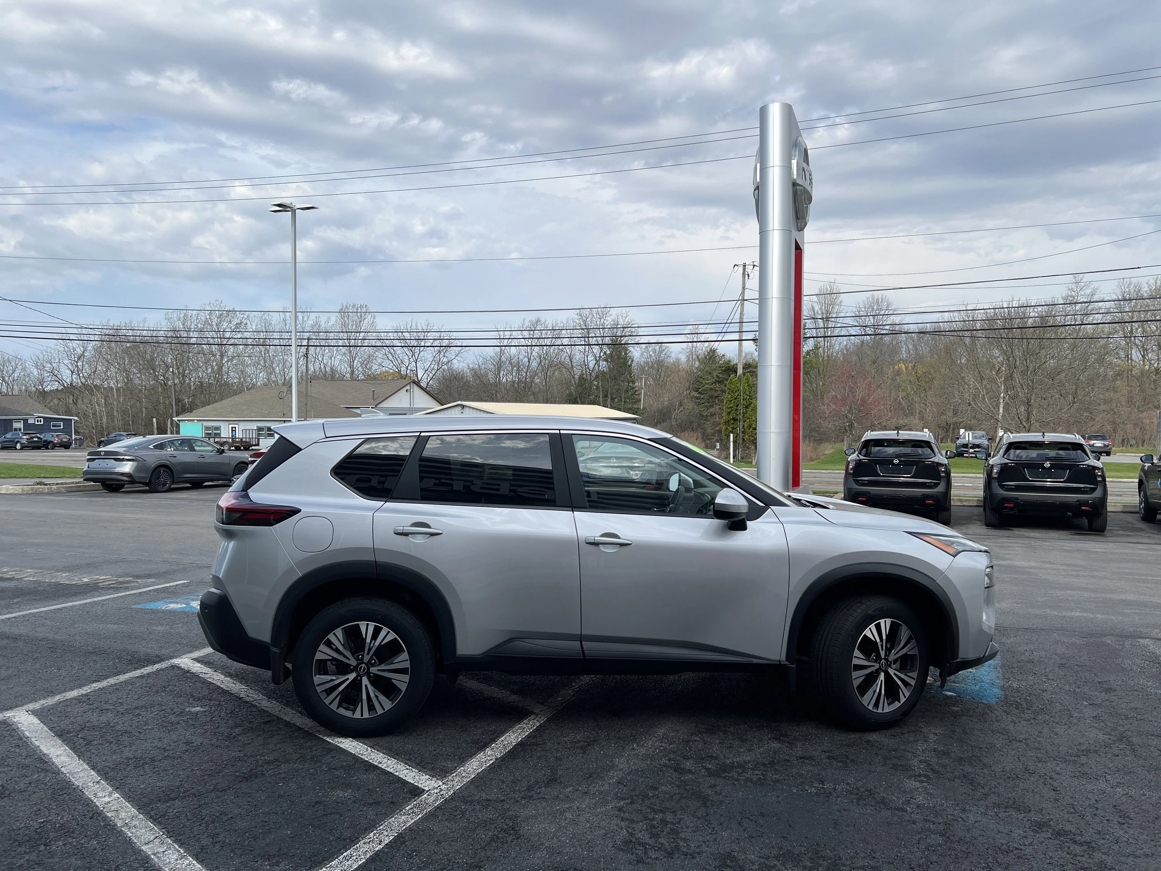Used 2023 Brilliant Silver Metallic Nissan SV image 9
