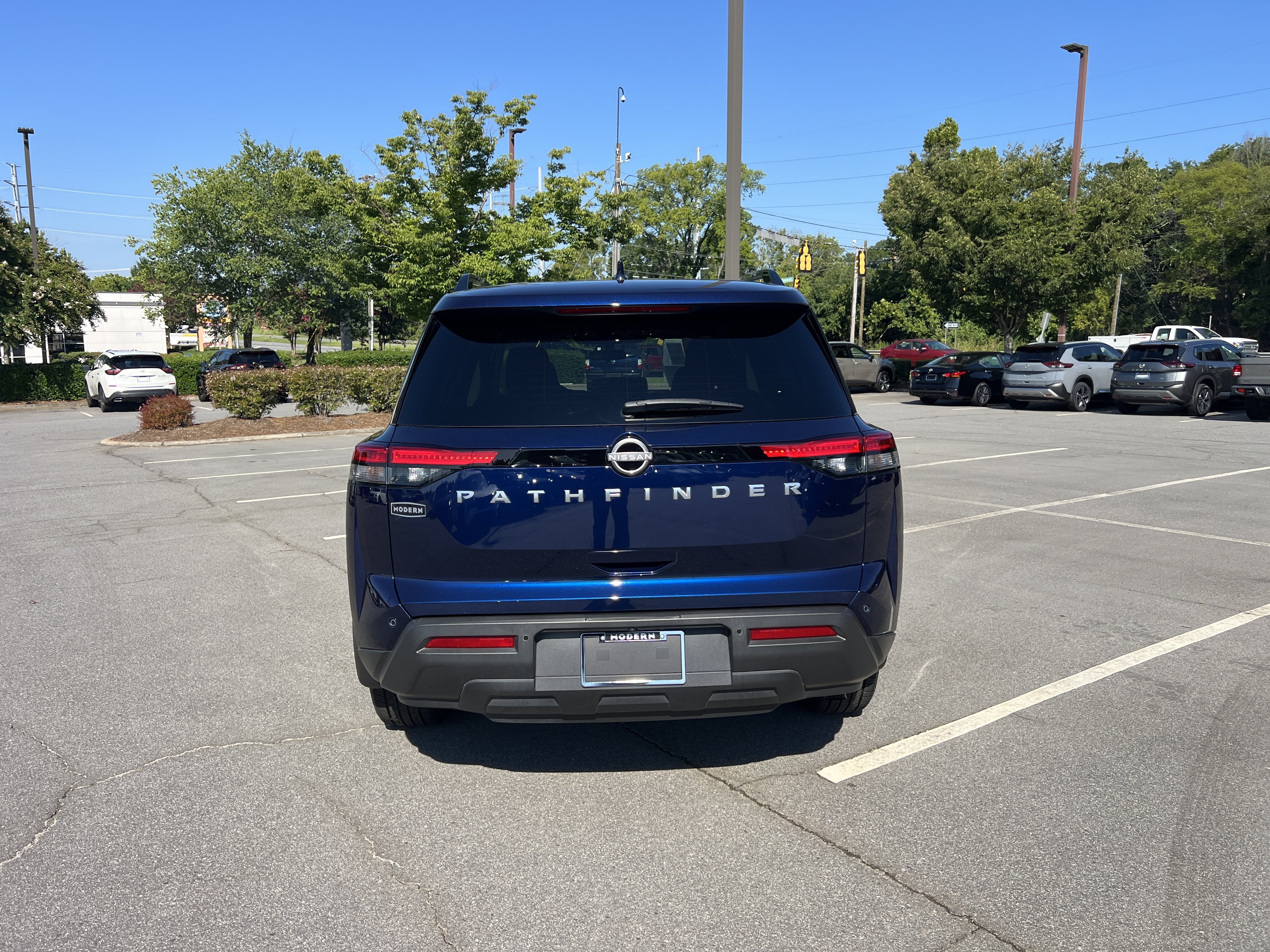 Used 2025 Deep Ocean Blue Pearl Nissan SV image 6