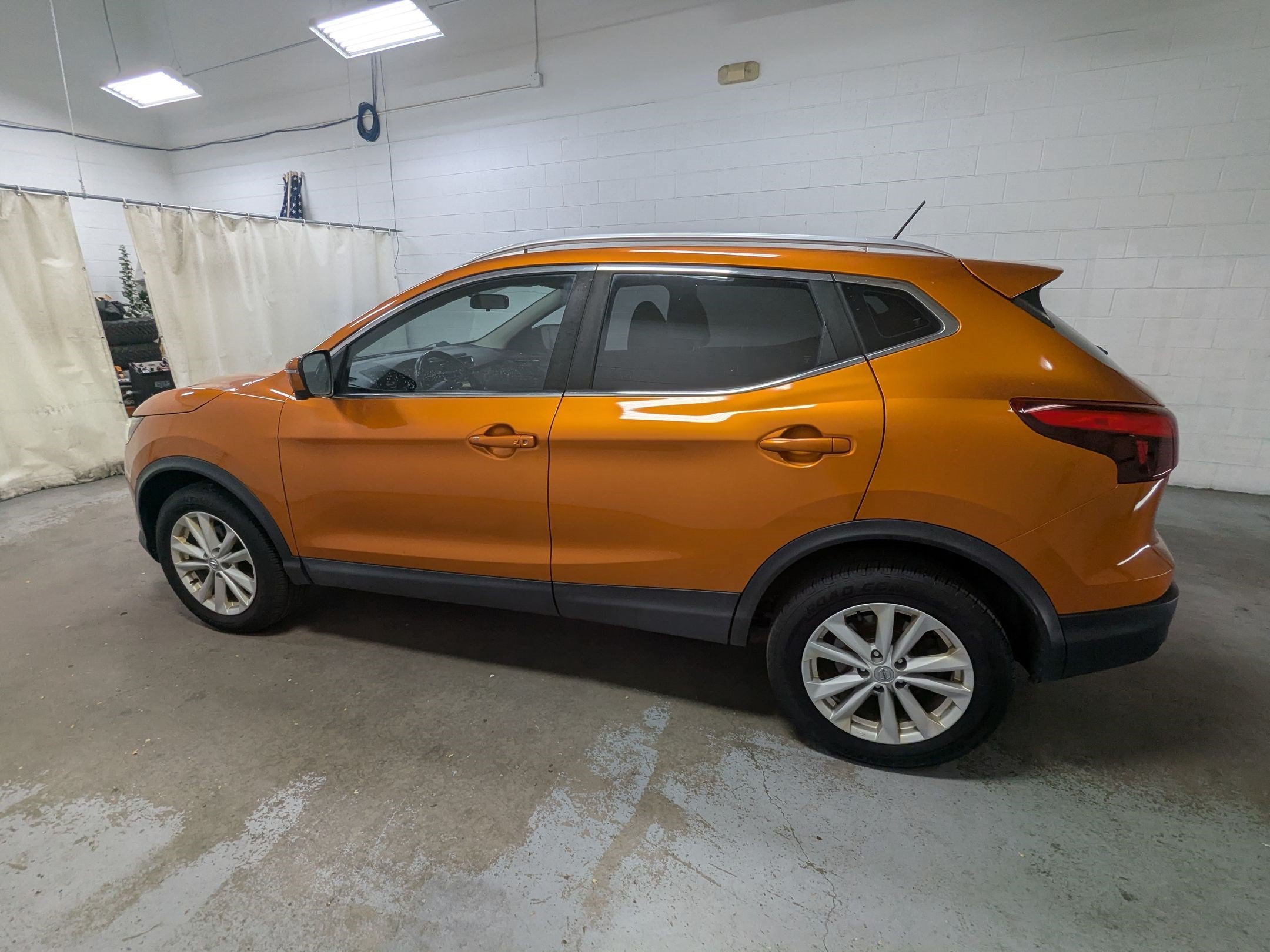 Used 2017 Monarch Orange Nissan SV image 8