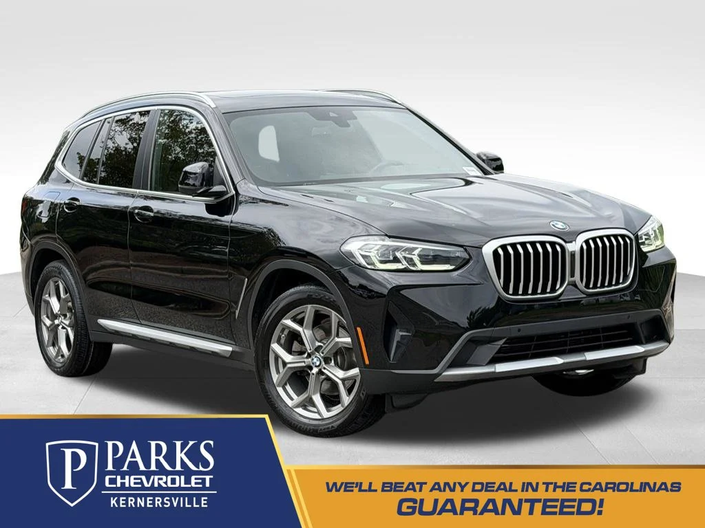 Used 2023 Black BMW sDrive30i image 1