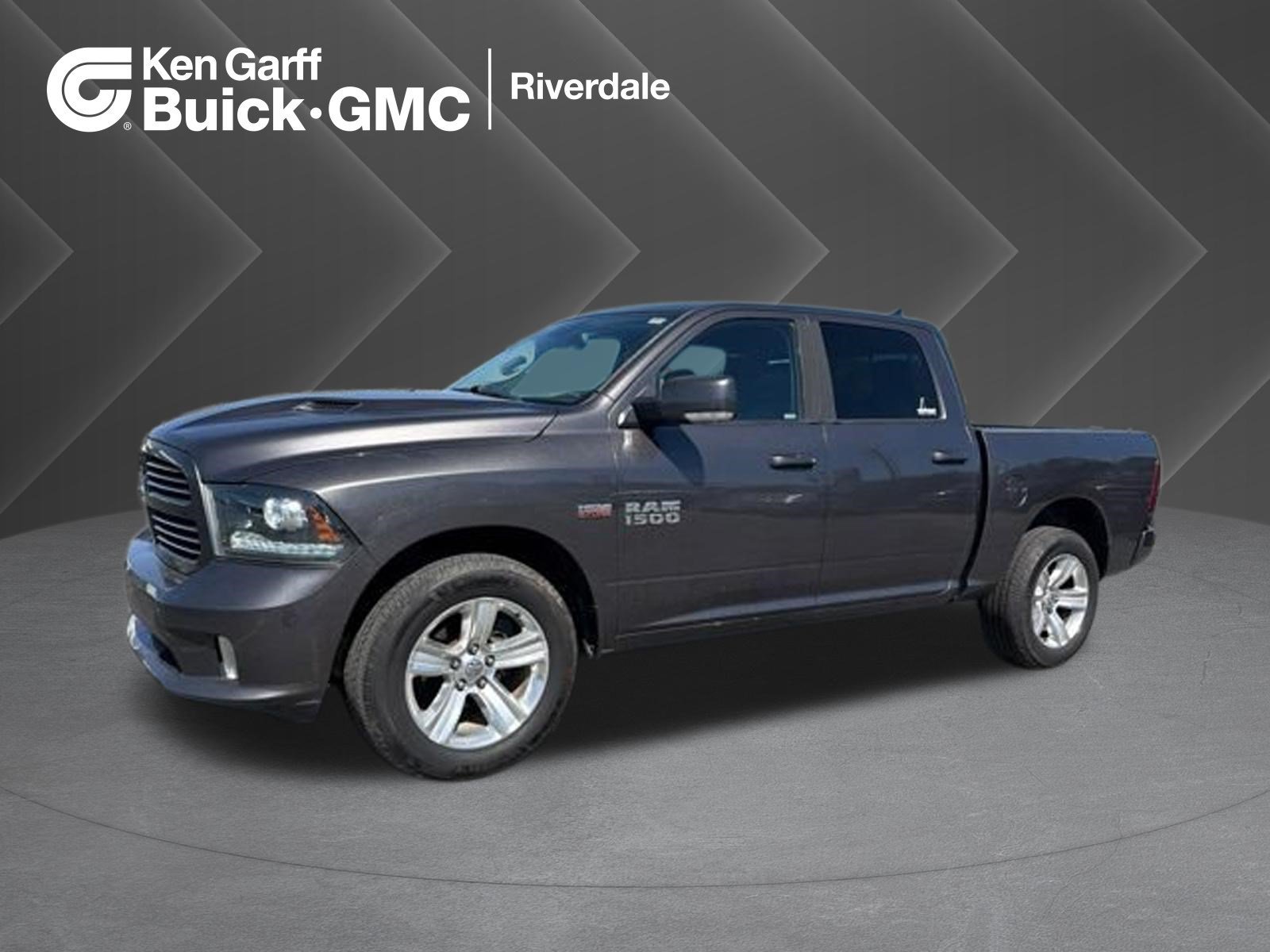Used 2014 Granite Crystal Metallic Clearcoat Ram Sport image 1