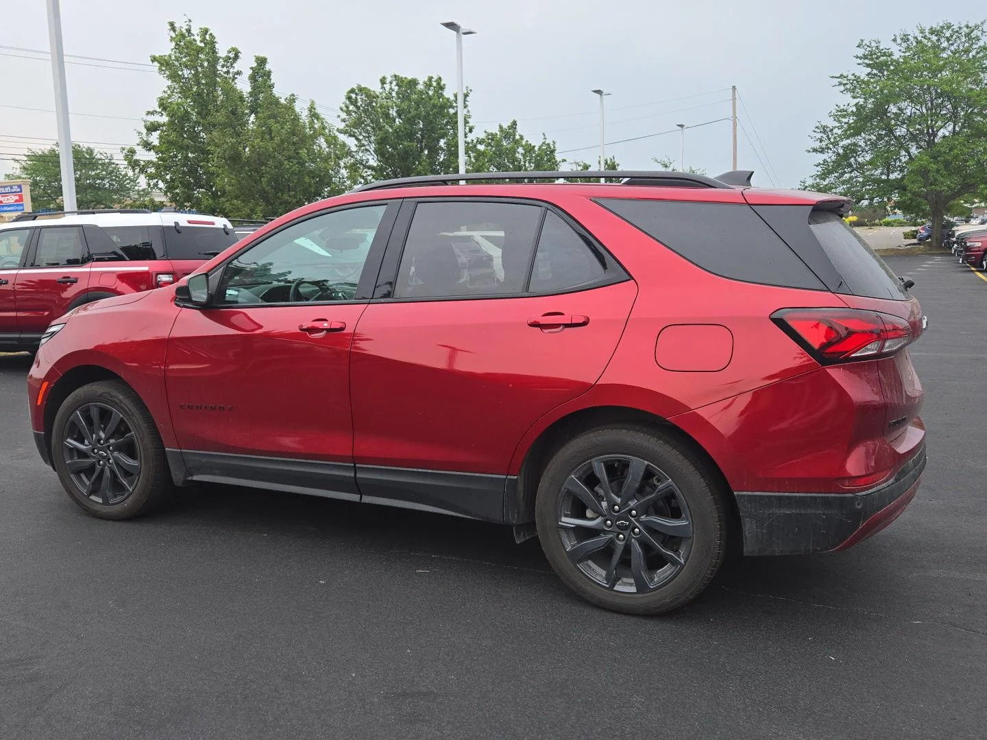 Used 2024 Radiant Red Tintcoat Chevrolet RS image 3