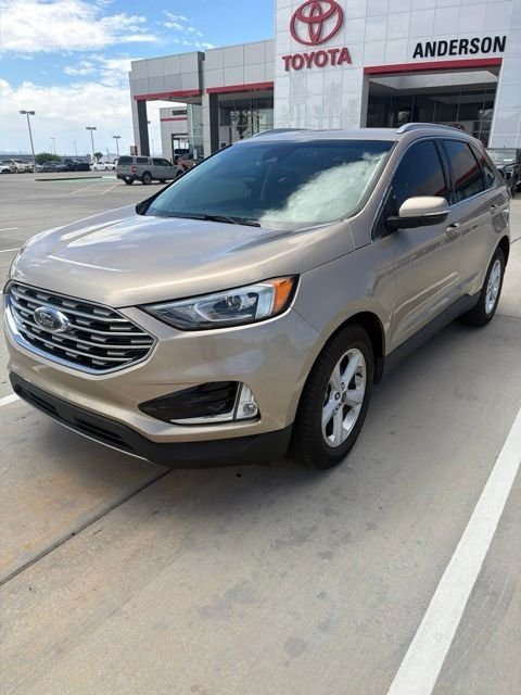Used 2020 Gold Ford SEL image 1