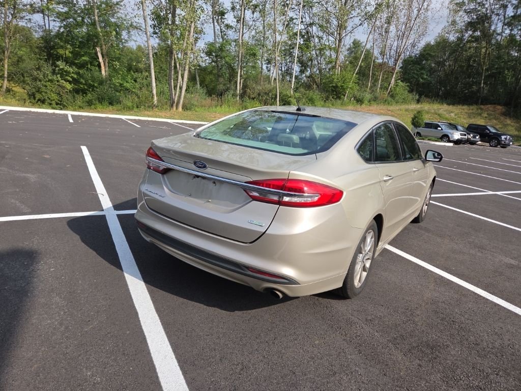 Used 2017 Gold Ford SE image 6