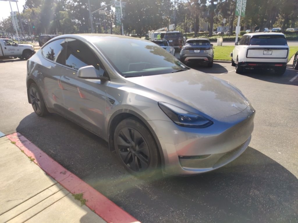 Used 2024 Tesla Model Y Long Range with VIN 7SAYGAEE2RF115340 for sale in Cerritos, CA