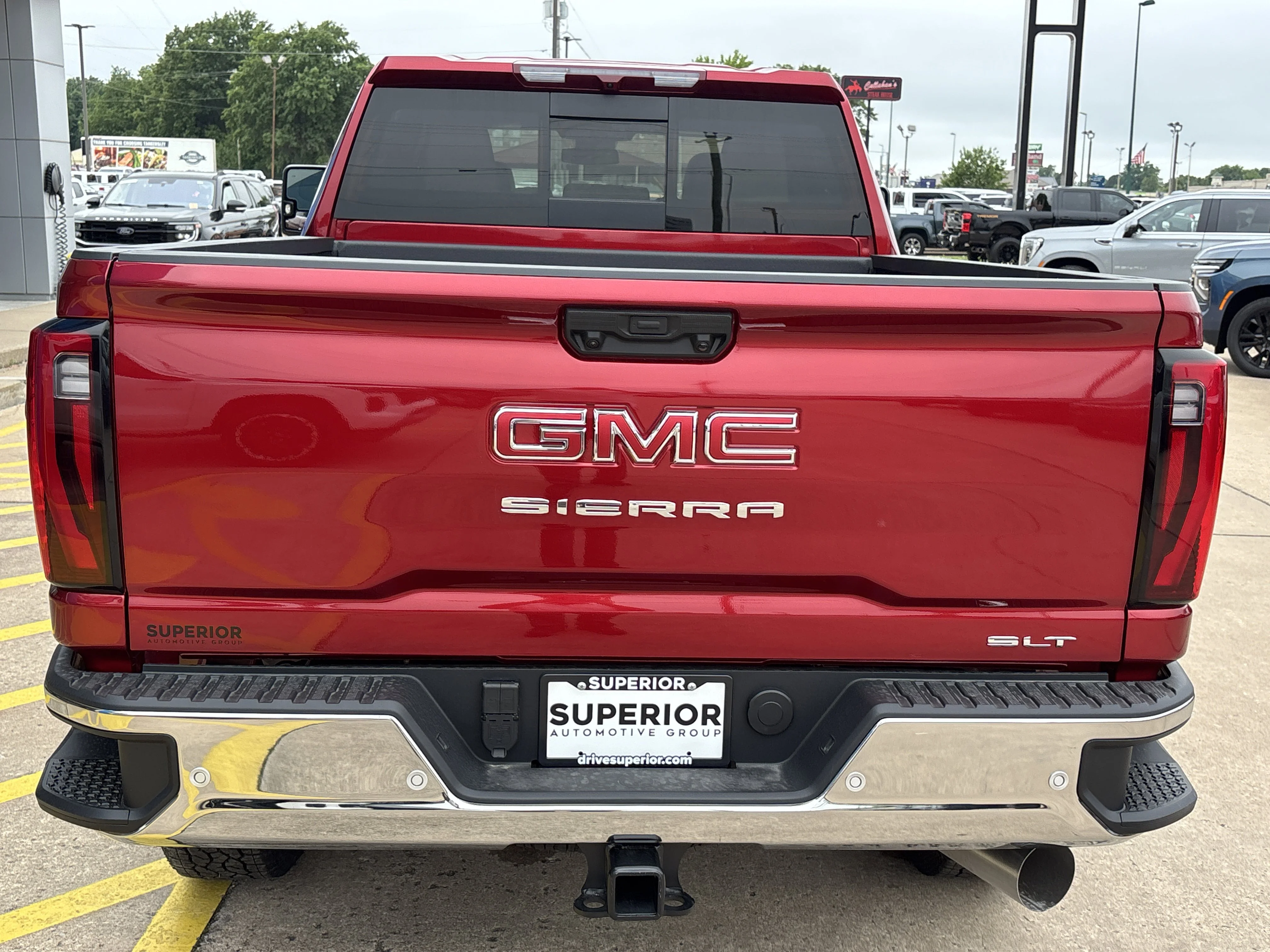 New 2026 Volcanic Red Tintcoat GMC SLT image 4