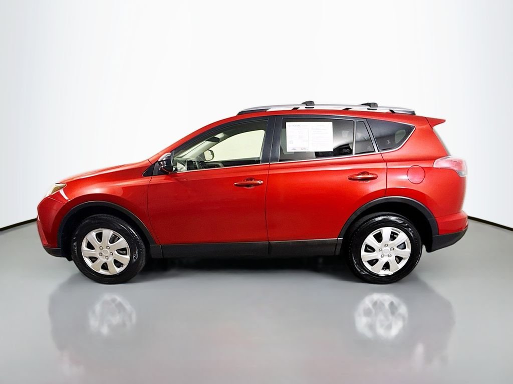 Used 2017 Barcelona Red Metallic Toyota LE image 4