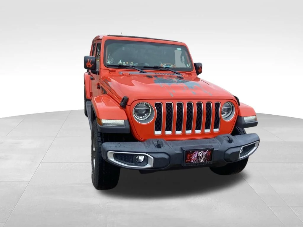 Used 2019 Orange Jeep Unlimited Sahara image 5